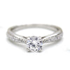 Round-Cut Solitaire With Accents Diamond Engagement Ring