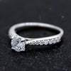 Round-Cut Solitaire With Accents Diamond Engagement Ring