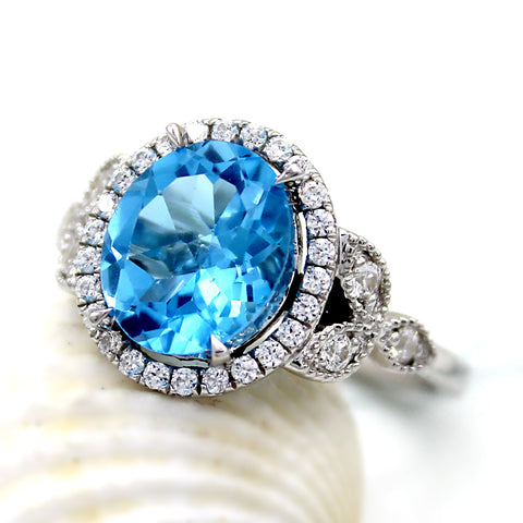 Natural Sky Blue Topaz Oval Halo Engagement Ring