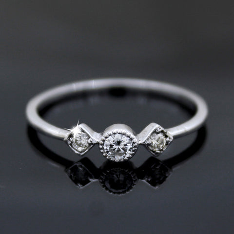 Three Stone Minimalist Diamond Engagement Ring