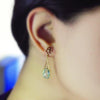 Blue Topaz and Diamond Dangling Earrings