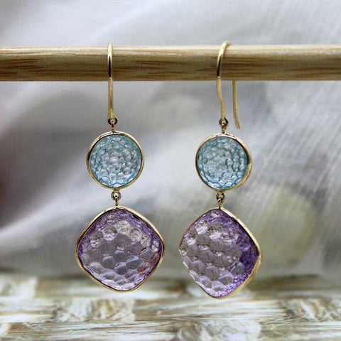 A unique Cut Amethyst and Blue Topaz Earrings