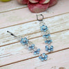 Dangling Blue Topaz & CZ Earrings